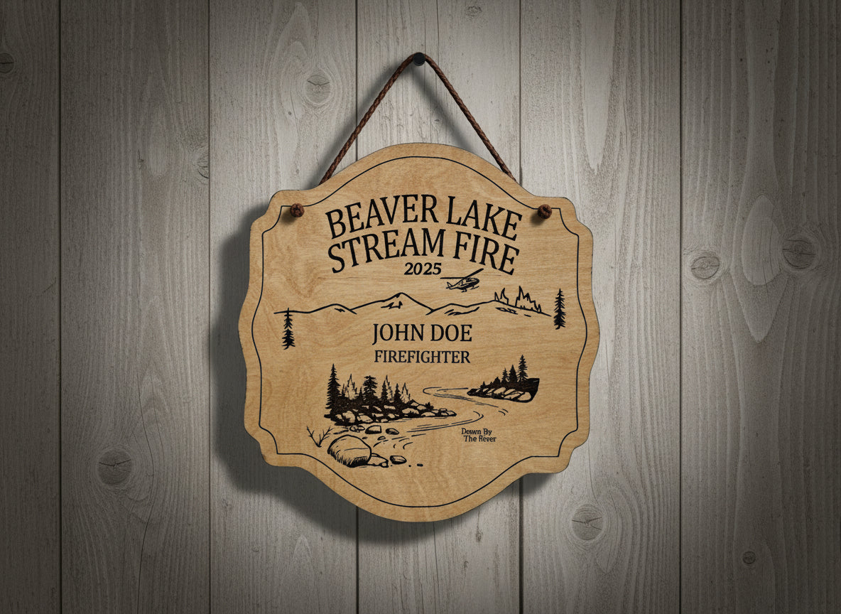 Wooden Fire plaque with engraved text and nature design on a wooden background